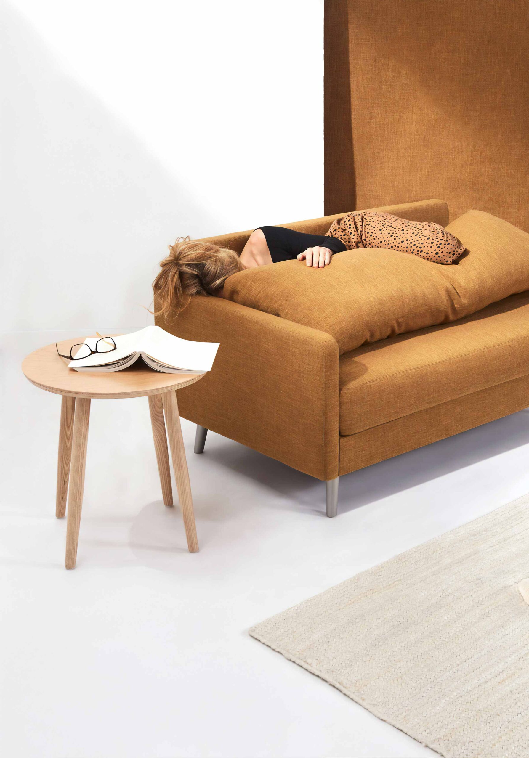 Woman Laying on Brown Sofa 2 Woman Laying on Brown Sofa 2